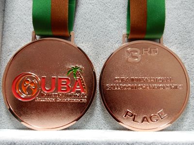 Bronze-tone third-place ballroom dance medal front and reverse with event logo and ribbon