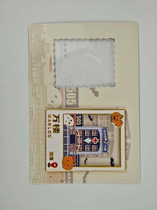 Cream rectangular postage-style souvenir with window cutout and printed storefront scene