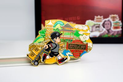 Layered souvenir depicting delivery rider and colorful traditional streets