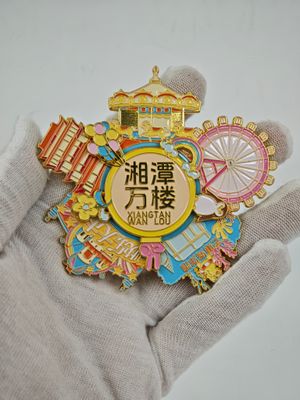 Colorful Chinese city magnet showing Xiangtan tower lettering and Ferris wheel